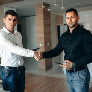 Young Businessmen Doing a Handshake