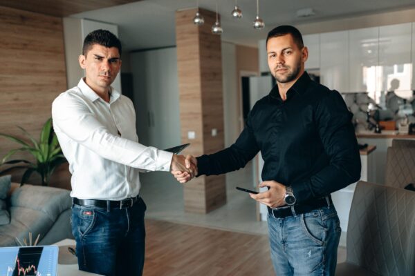 Young Businessmen Doing a Handshake